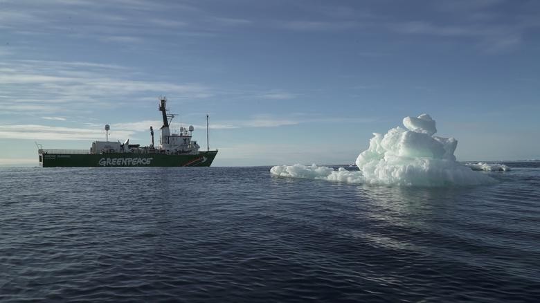 The Greenpeace's Arctic Sunrise ship is seen near floating ice at the Arctic Ocean. REUTERS/Natalie Thomas  
